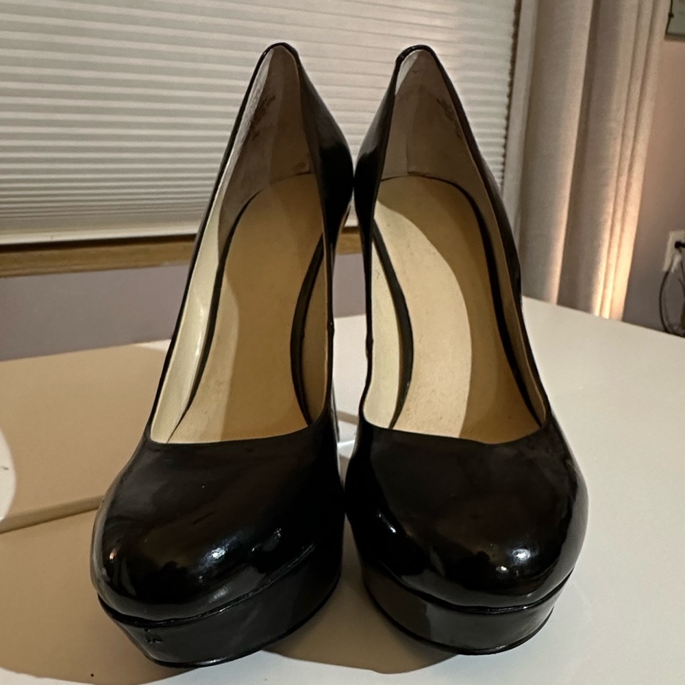 Black patent leather 4 1/2” heel Nine West heels. Gently worn.